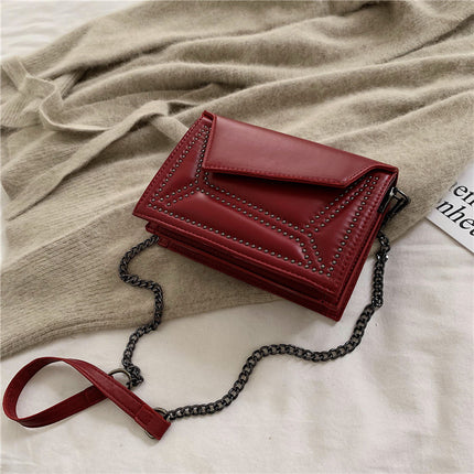 Cross-body rivet bag for lady