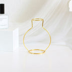 Small round bottle gold
