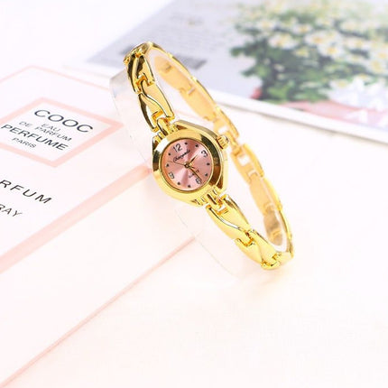 OL Women's Carved Gold Stainless Steel Fashion Watch