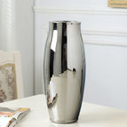 A silverplated tall vase