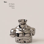 Silver plated chest muscle